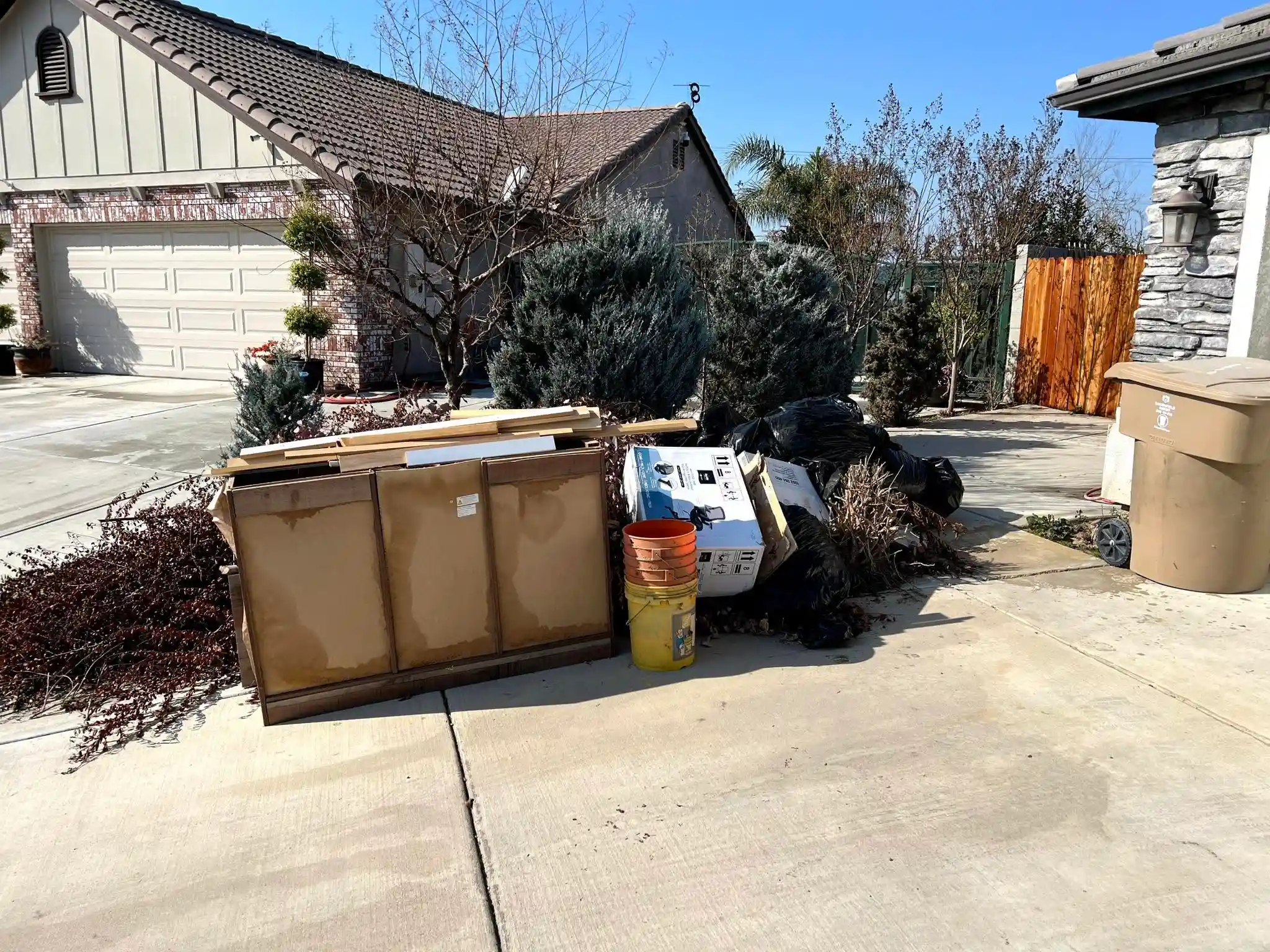 Real residential garage cleanout completed by Golden Kern in Bakersfield